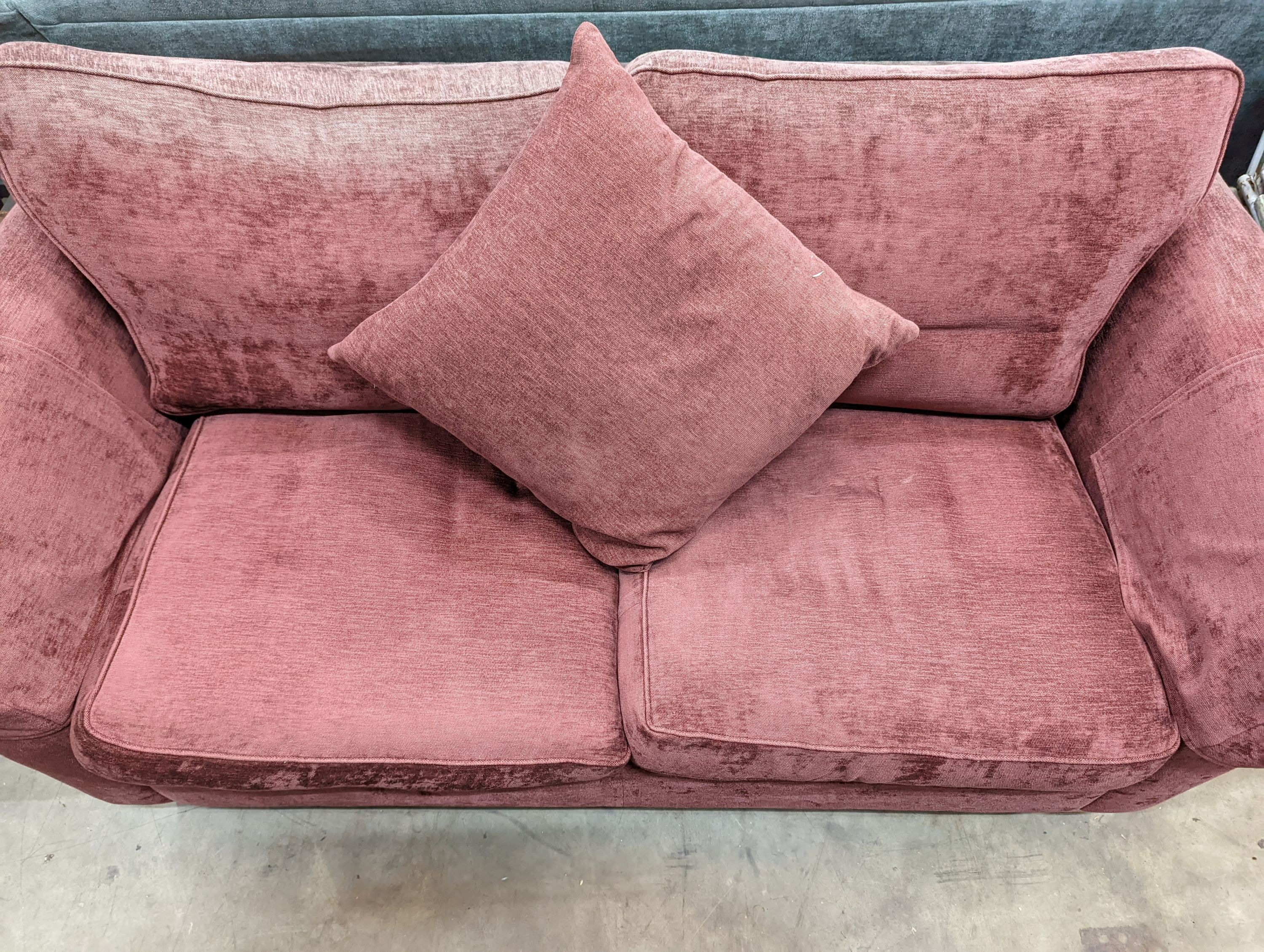 A contemporary plum fabric two seater settee, length 176cm, depth 84cm, height 86cm